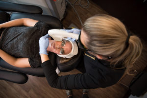 doctor helping patient