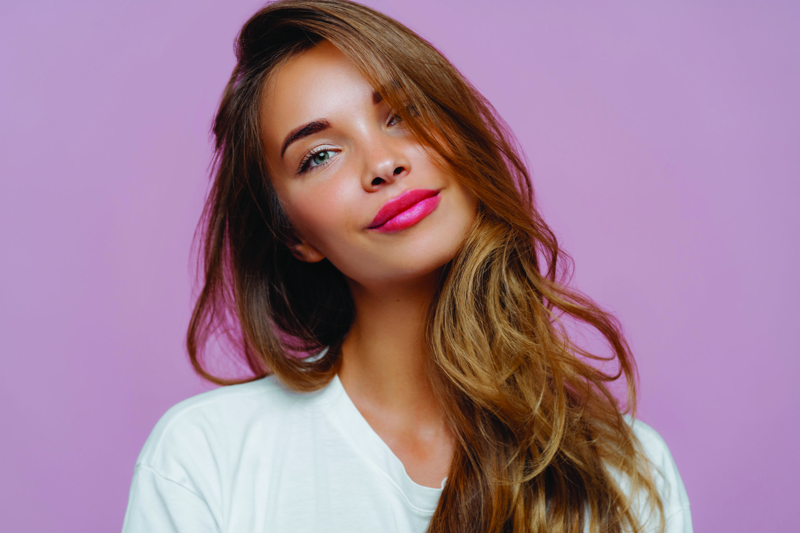 girl with red hair staring off